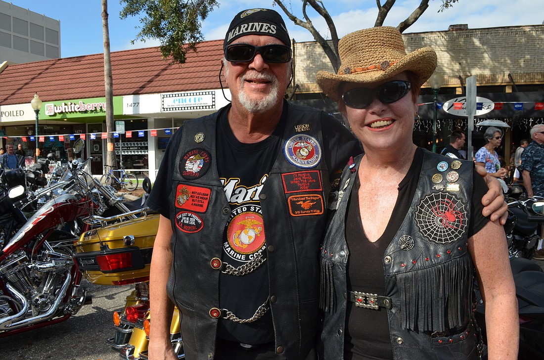 Dennis and Brenda Baron take in the festivities at the Thunder by the Bay Motorcycle Festival.