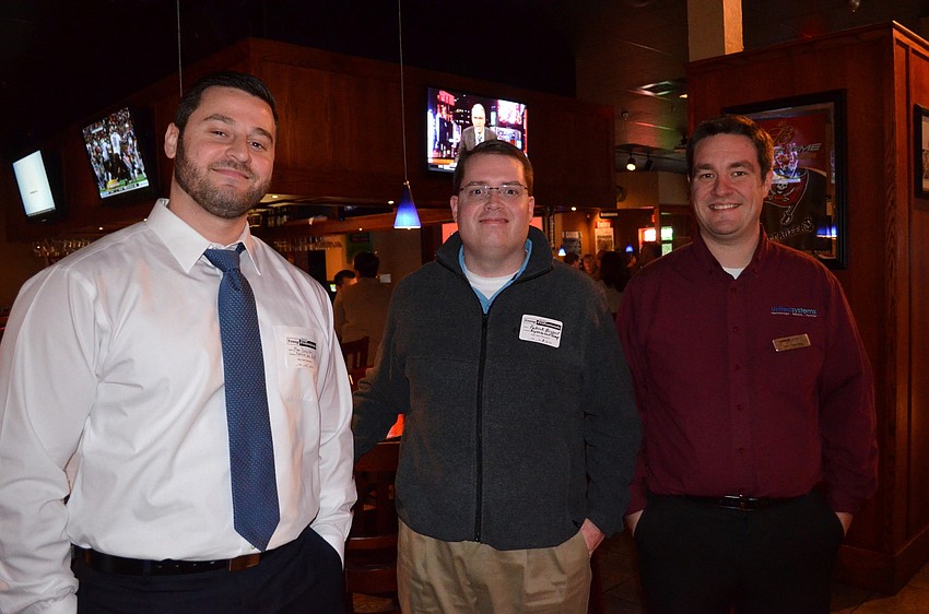 Matthew Bobulsky, Patrick Bryant and Dan Gladding make new friends.