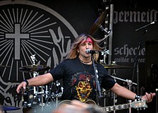 Guitarist and vocalists Joey Bravo performs for the band Lazy Bonez.