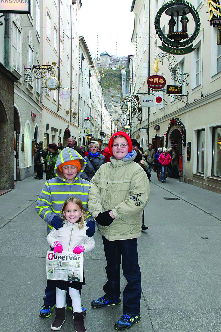 CLASSICAL CHRISTMAS. Gabriel, Celia and Curran McDerment enjoyed looking at Christmas lights in Salzburg, Austria, while on a trip with their family from Munich to Vienna. Here they stand on the street where Wolfgang Amadeus Mozart grew up.