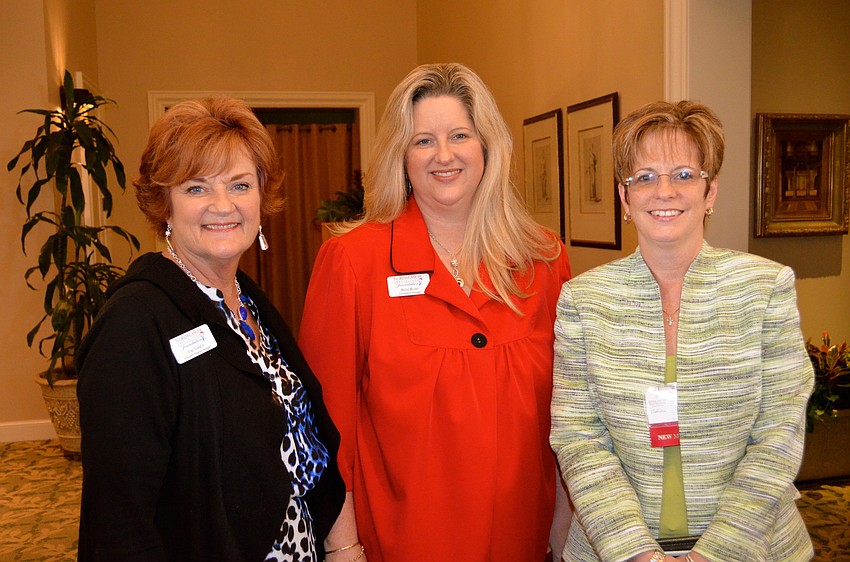 Val Vance, Beth Bush and Pam Charron chat before the event gets underway.