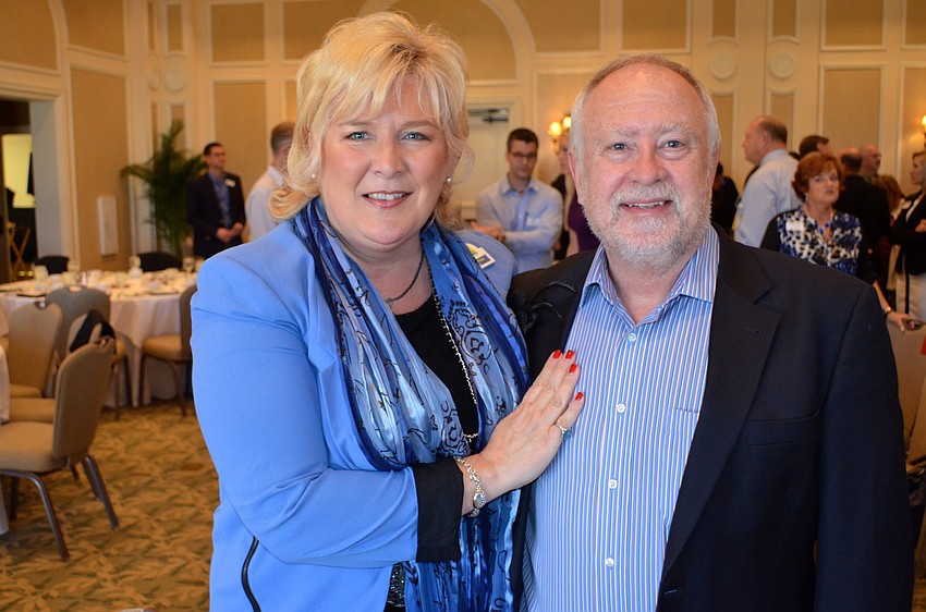 Meals on Wheels PLUS CEO Maribeth Phillips and Schroeder-Manatee Ranch CEO Rex Jensen spend time with friends.