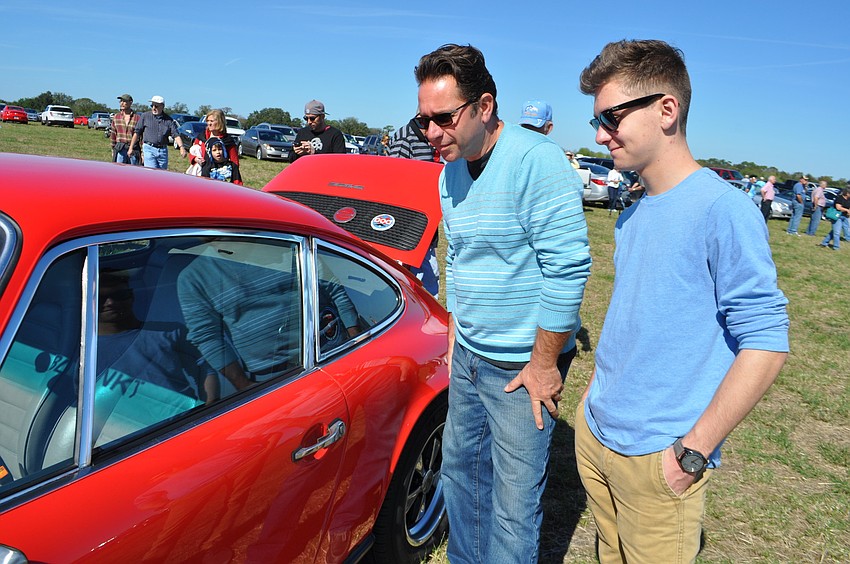 Patrick and Olivier Bellanger check out a classic Porsche, their favorite.
