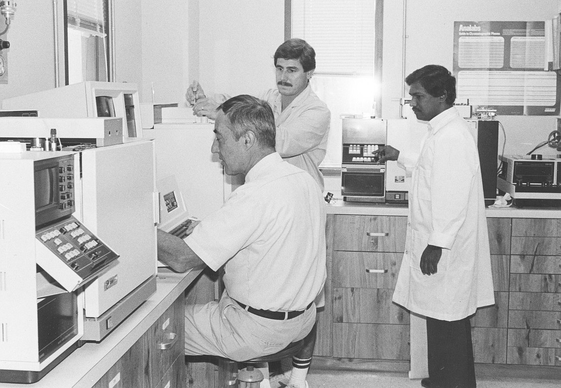 Kumar Mahadevan, right, in Mote's laboratory.