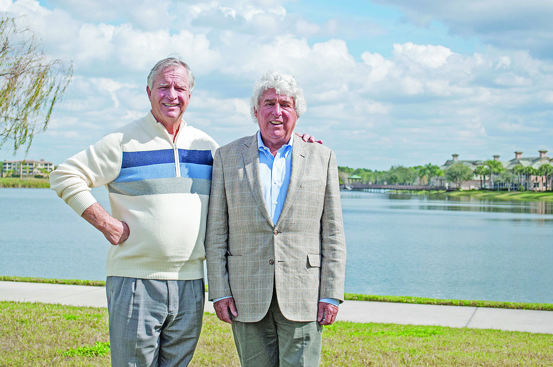 Realtor John Swart and Larry Pearce, managing partner of Realco, are eager to begin sales at The Lakeshore, a 44-unit luxury condo project slated for the Lakewood Ranch Main Street area. Photo by Pam Eubanks