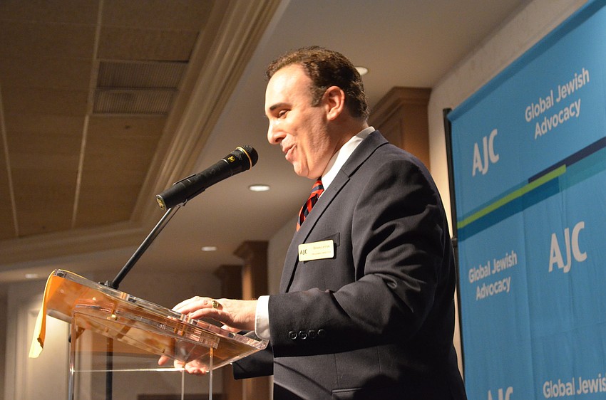 AJC West Coast Florida Regional Director, Brian Lipton addresses the sold-out audience for the luncheon.