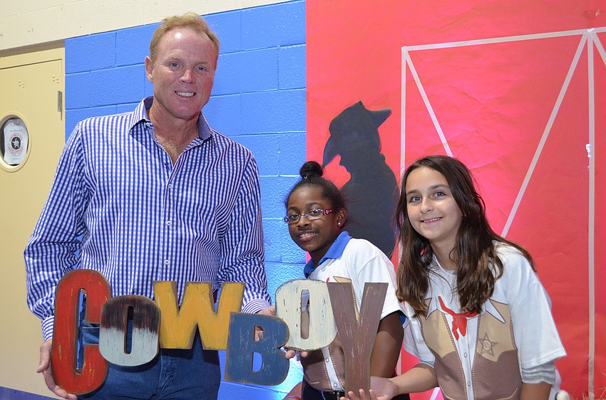 David Glorius with Boys & Girls Club students Iniyah Martell and Maria Nicolosi at Steak & Burger to celebrate the Youth of the Year.