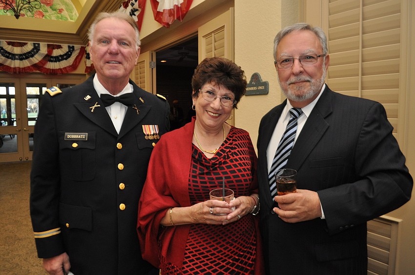 U.S. Army Reserve Ret.Â Lt. Col. Dennis Dobbratz poses with Annette and Bob Ducatelli, retired Air Force.