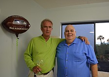 Seahawks fans George Stensgard and Matt Brieske cheer on their team at Longboat Terrace.