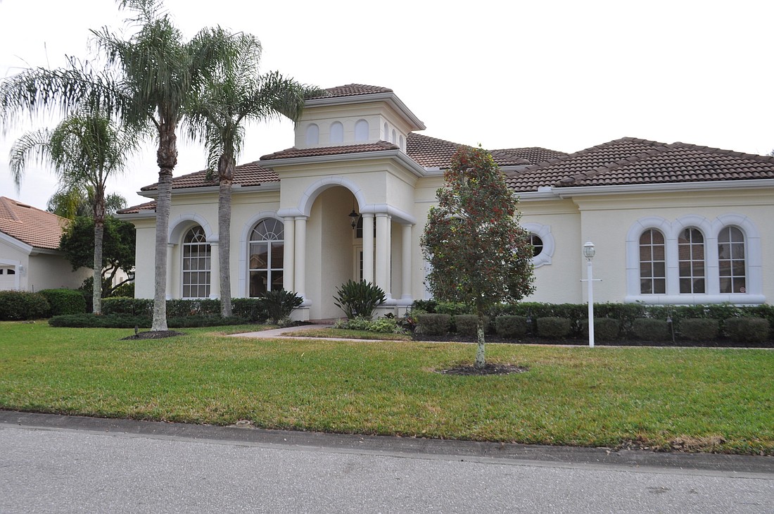 This home at 8016 Royal Birkdale Circle has four bedrooms, three-and-a-half baths, a pool and 3,610 square feet of living area. It sold for $980,000. Photo by Pam Eubanks