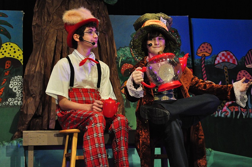 Ryan Guendjoian and Brennan Maguire, as the March Hare and the Mad Hatter, Â celebrate a non-birthday together.