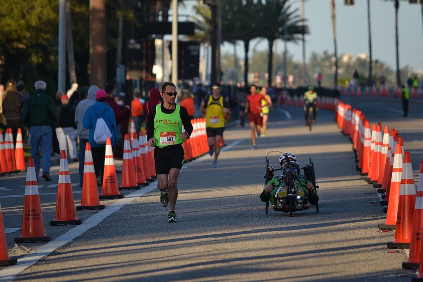 Runners approach Gulfstream Avenue from the John Ringling Bridge during the Sarasota Music Half Marathon.