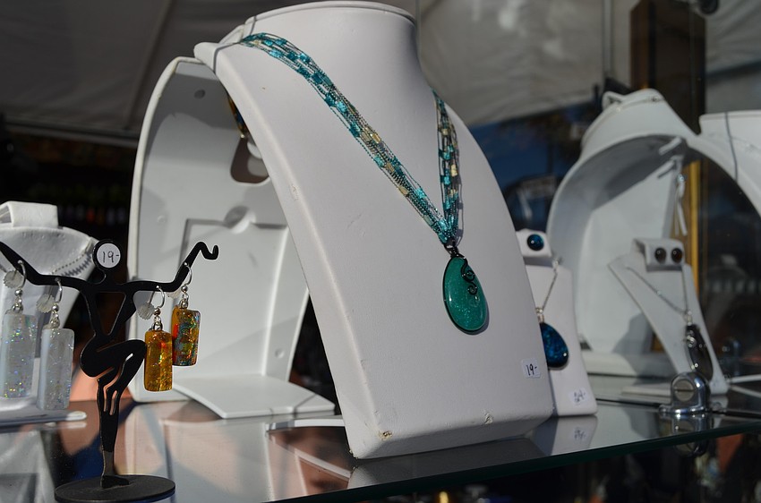 A necklace from Glass Garden Jewelry on display at the Siesta Key Craft Festival.
