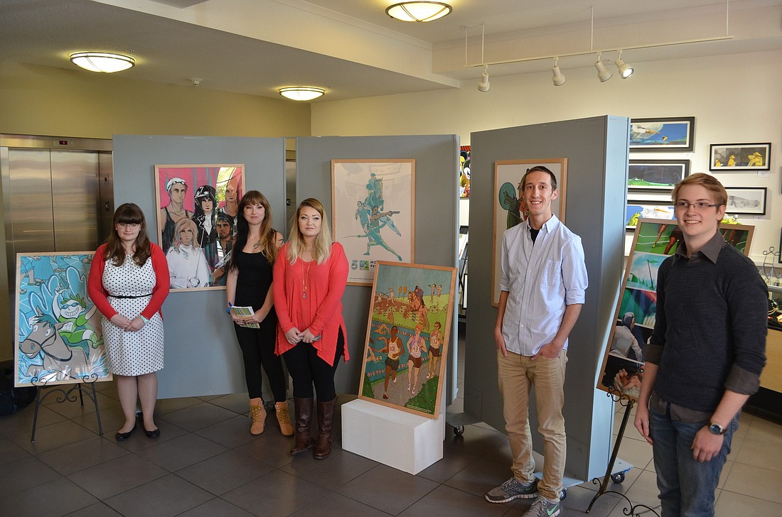 Ringling College students Katherine Granger, Cameron Kramer, Hailey Patalano, Kyle Beckett and Kade O'Casey stand in front of their winning designs.