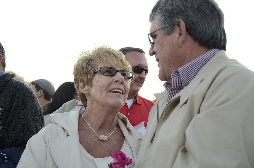 Kim and Cecil Calloway repeat after Special Magistrate Edward Wilson. They have been married for 50 years.