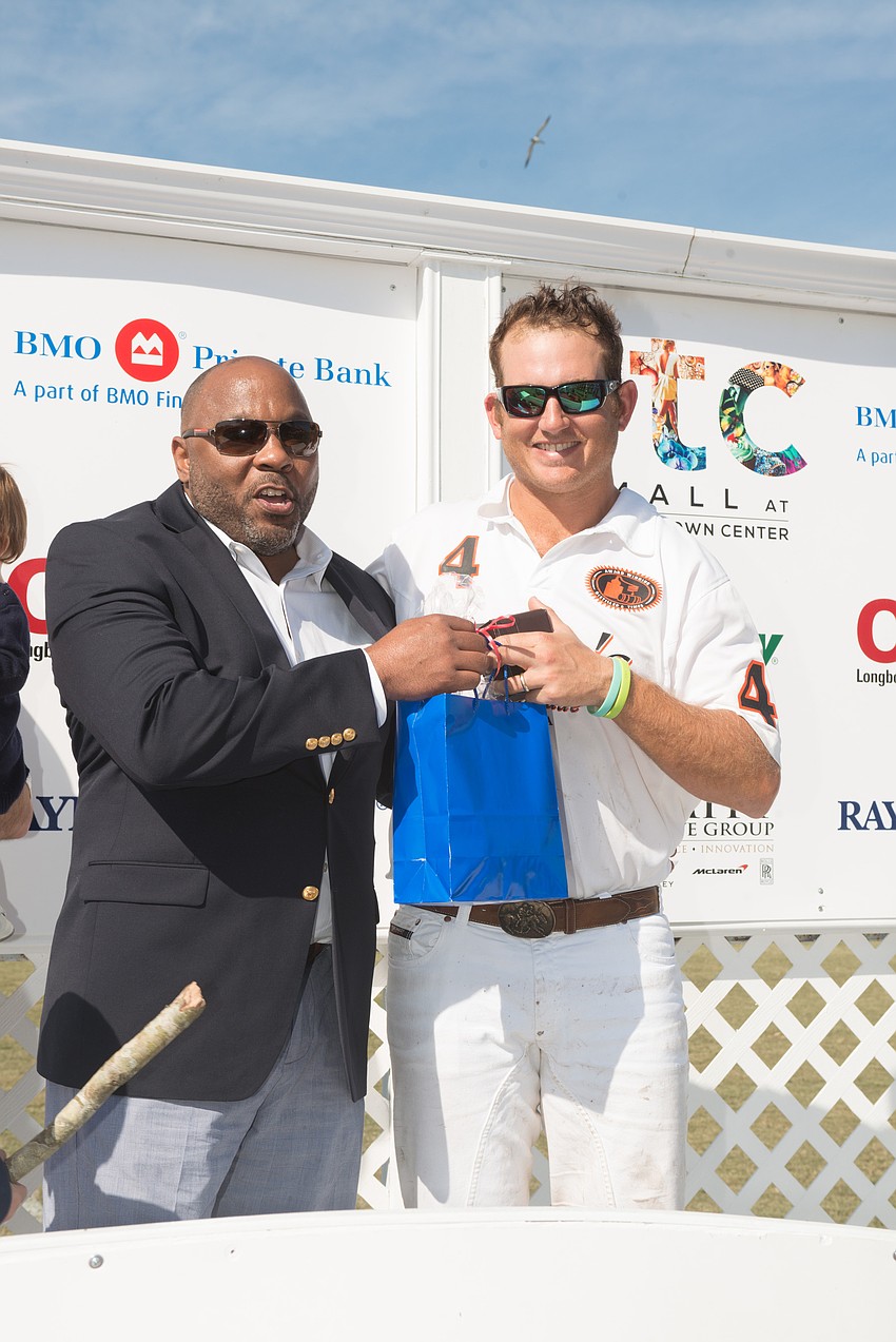 Tito's defeated Southside 17-7 Sunday in a Presidents Day-themed Juvenile Diabetes Research Foundation Cup. Steve Krueger, right, receives the Most Valuable Player award.
