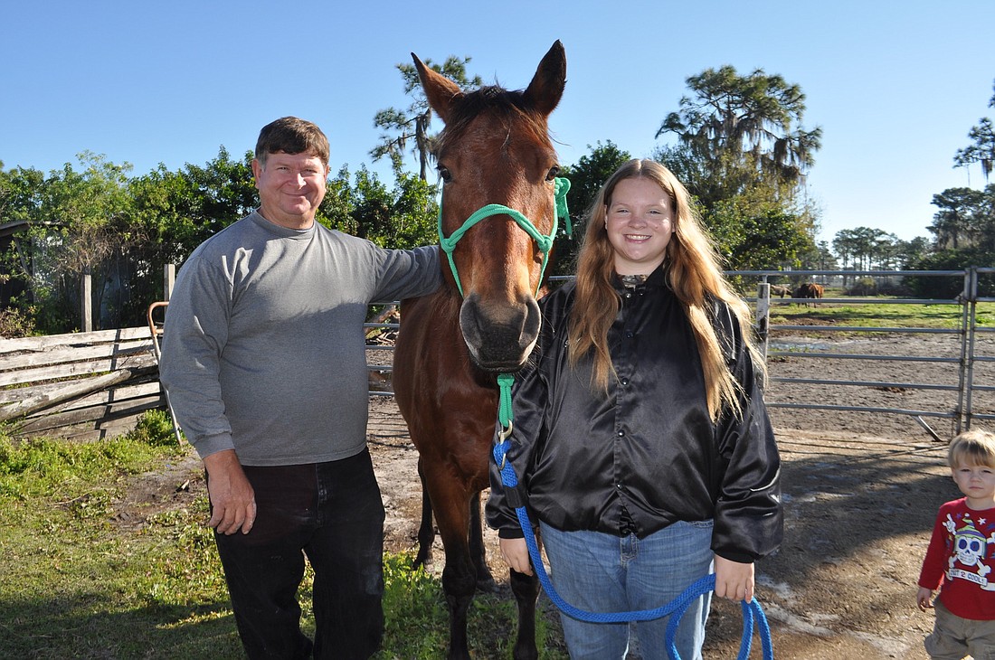 Mike and Makayla Harrison love the history and horsemanship involved in riding the Florida Cracker Trail. Photo by Pam Eubanks