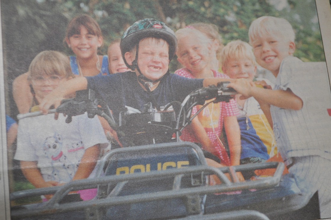 Sean Thompson and other Longboat Key kids got to ride a Longboat Key Police Department all-terrain vehicle in 1998, at Bayfront Park Recreation Center's summer camp. Courtesy photo