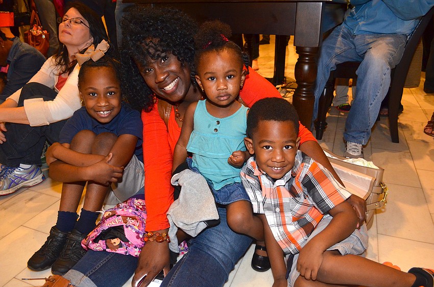 The Williams family â€” Faith, Cece, Destiny and Judah â€”Â watch the Pine View School choir perform.