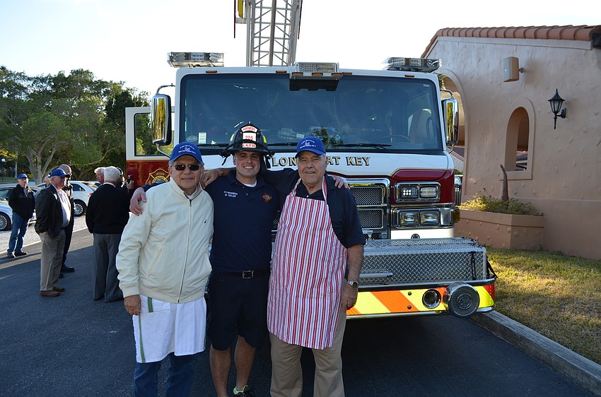 Leonardo Distefano, firefighter and paramedic Matt Taylor and Joe Zampino