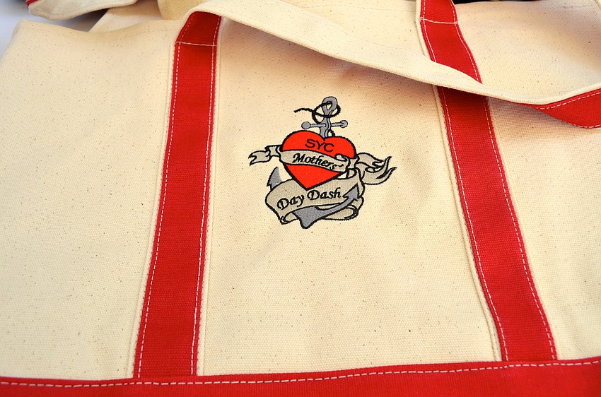 T-shirts, hats and bags with the Motherâ€™s Day Dash logo were for sale during the event.