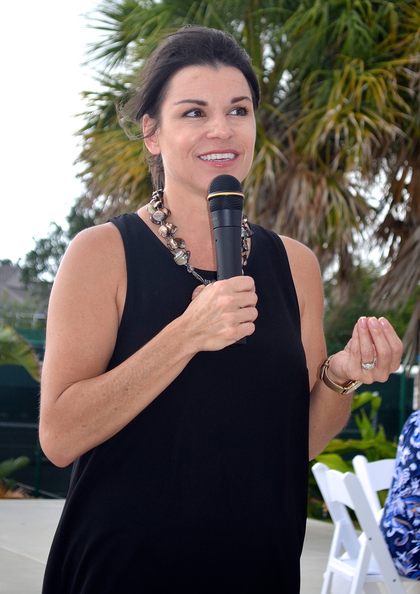 Elizabeth Fisher, co-founder of Selah Freedom, welcomes guests.