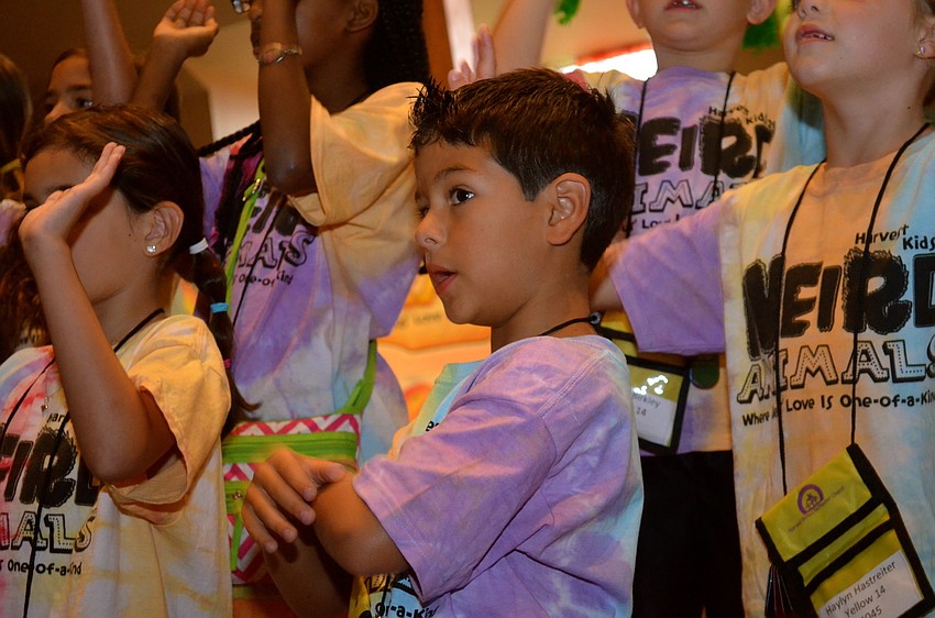 Carlos Guerra dances to the music.