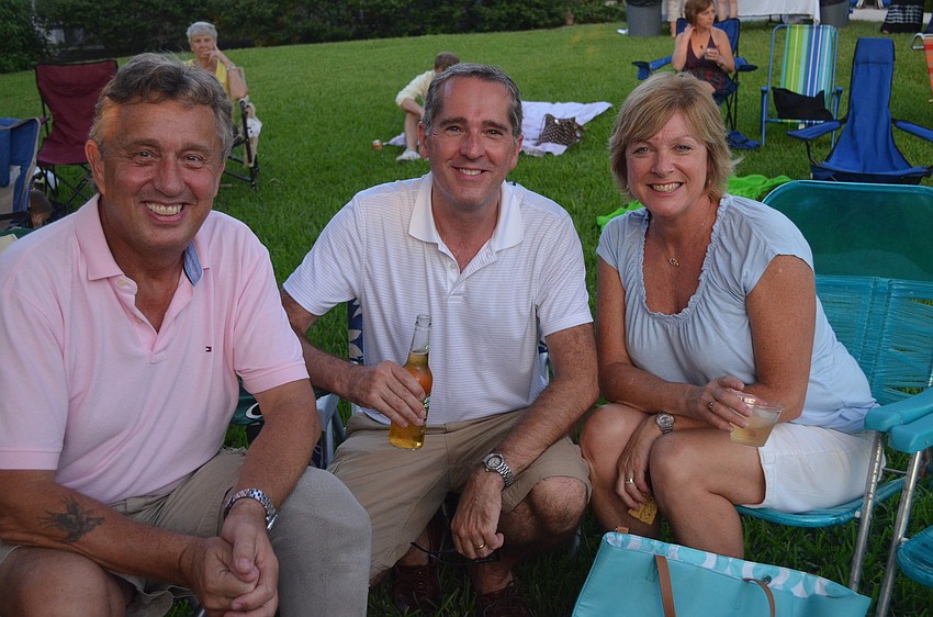 Rod Thomas, president of the Nokomis Chamber of Commerce, with Tony and Gill Bartlett