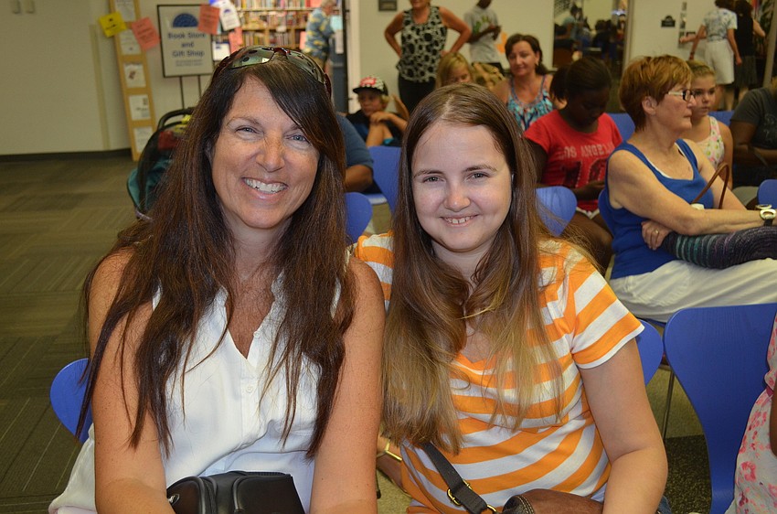 Donna Peregoff with daughter, Victoria Parris, support Alexandria Campbell.