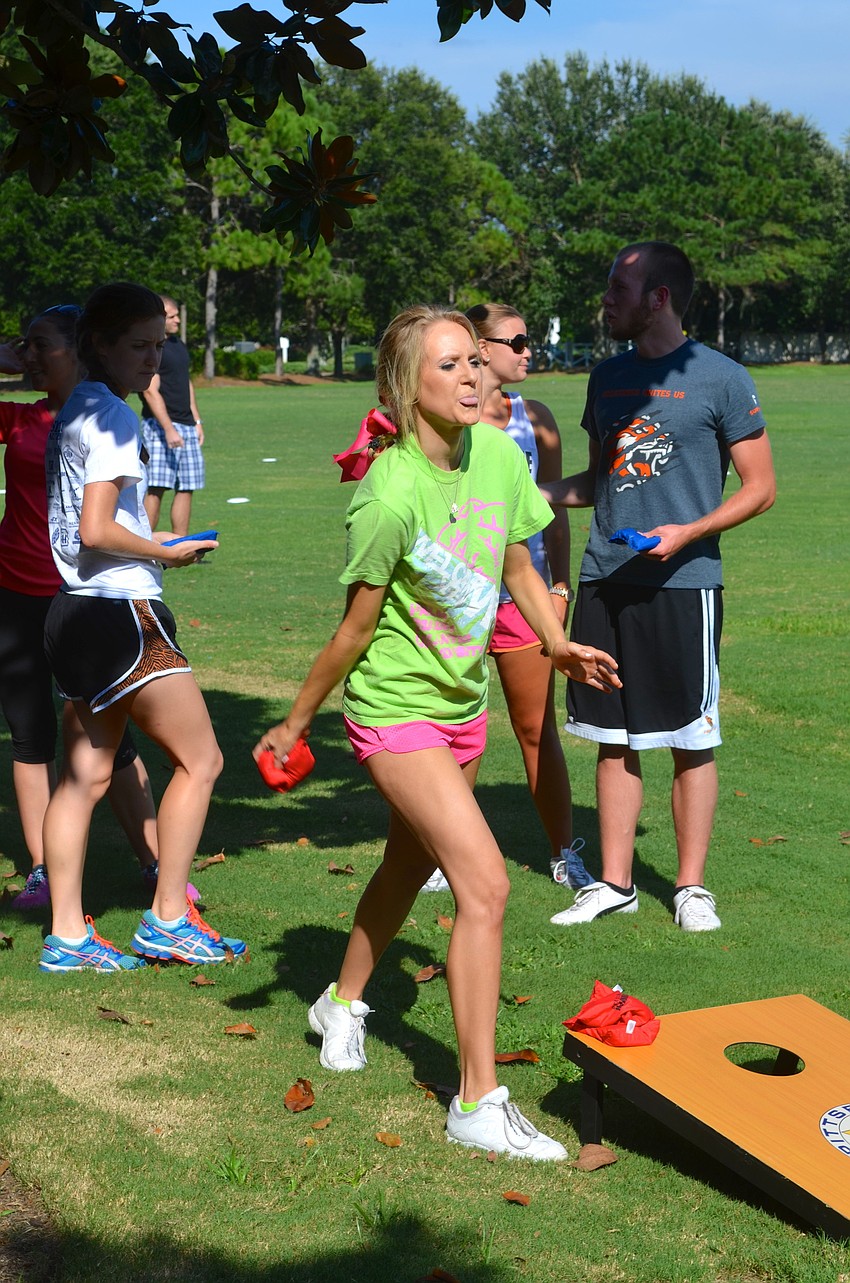 Katie Tribuls practices her throwing technique.
