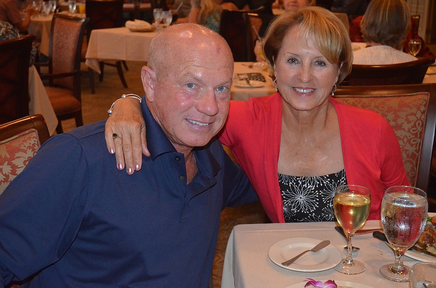 Vern and Linda Frazier spend the evening with friends.