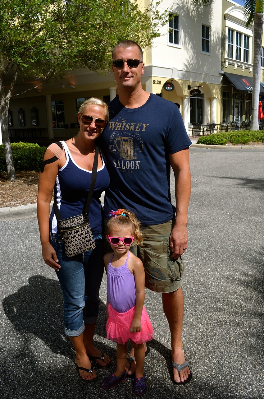 The Neri family â€” Bianca, John and Juliana.