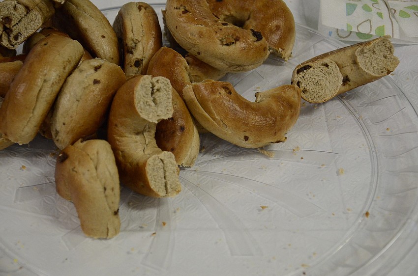 Families and teachers snacked on bagels and fruit after Temple Emanu-El's religious school orientation Sunday.