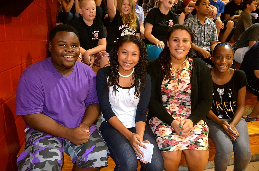 Darius Starling, Ahliya Betterson, Mya Martinez and Jemima Raymond are eighth-grade students.