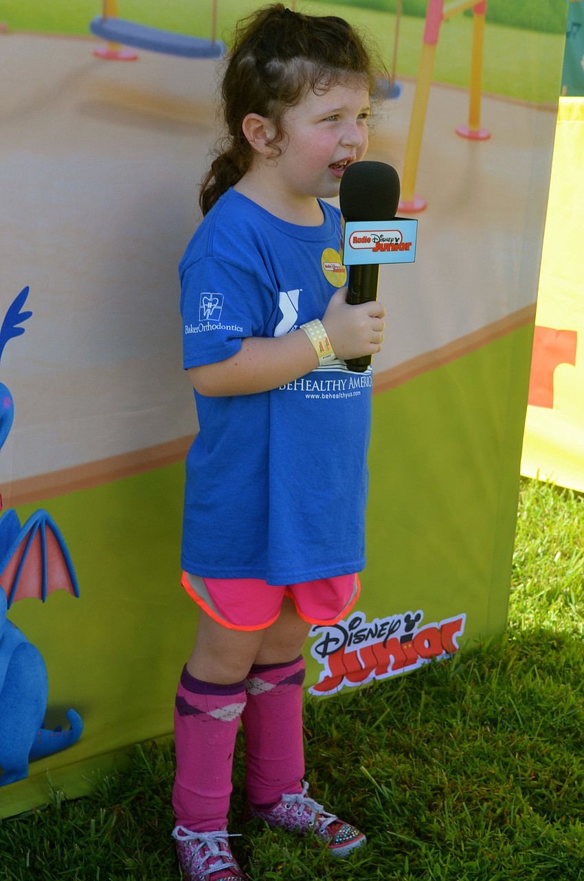 Five-year-old Jules Whittemore sings a song from 