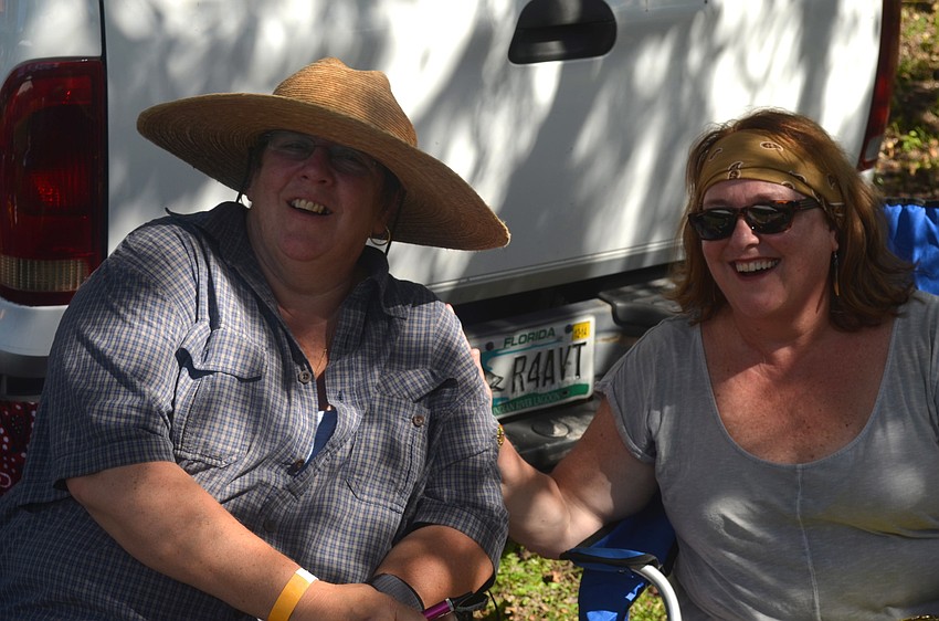 Joy Fitzpatrick and Nancy Colby relax in the shade.