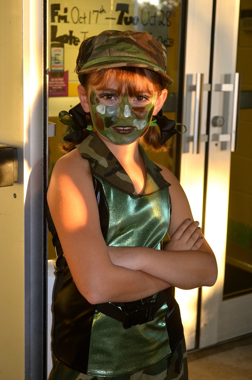Soldier Erin Galvin guards the front doors.
