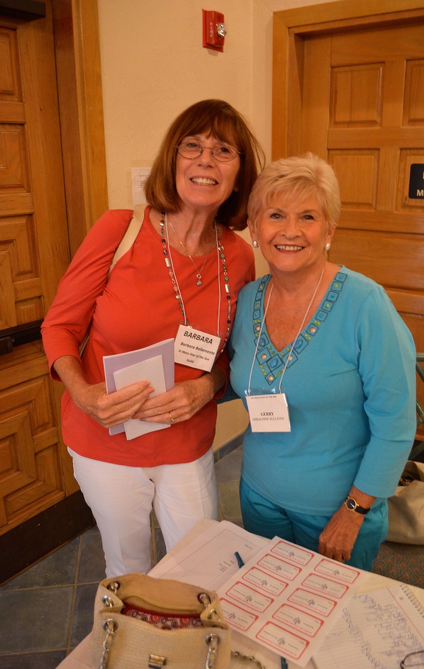 Barbara Bellamente and Gerry Sullivan chat before sitting down for lunch.