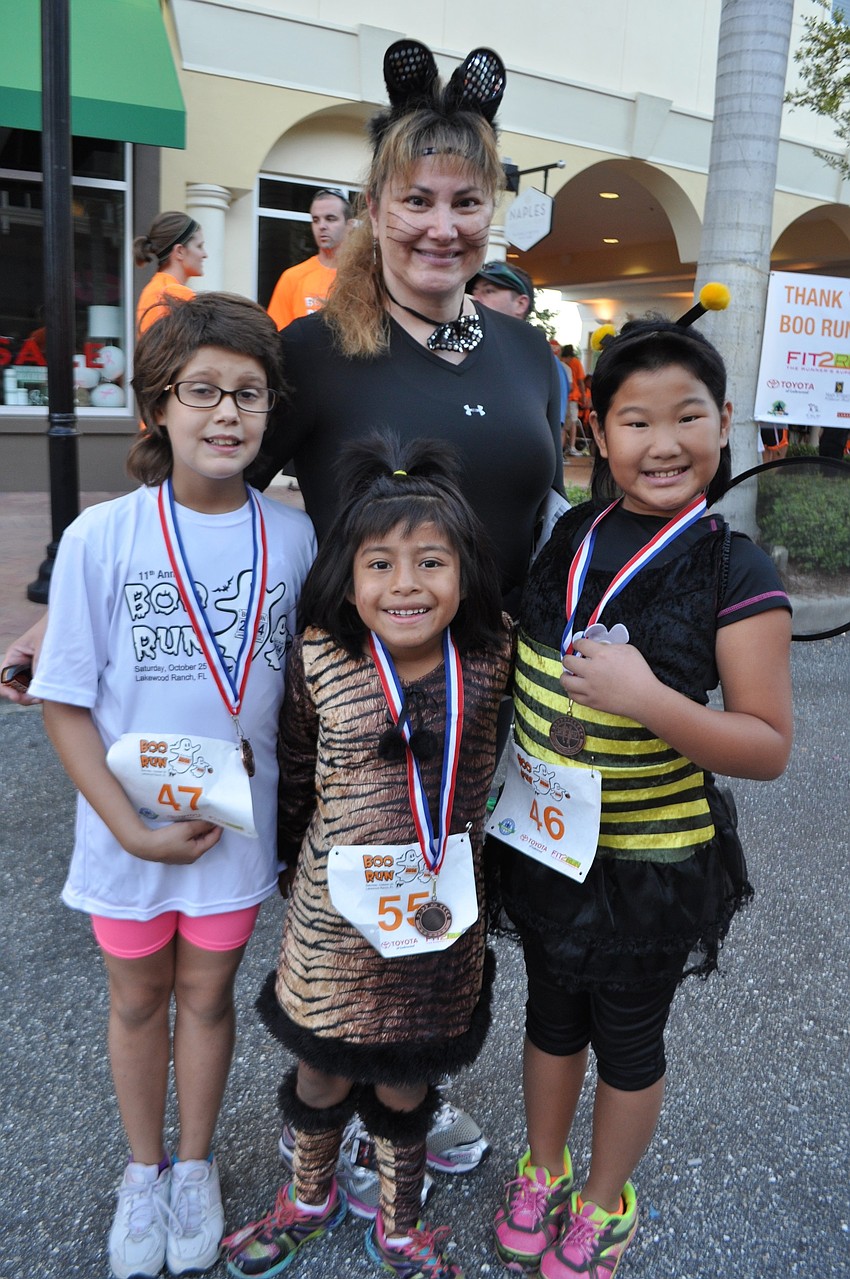 Lisa McDonnell attends with her daughters, Makayla, Jaden and Cambria.