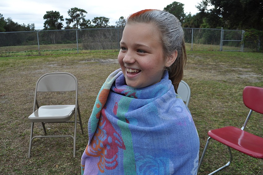 Rachel Mahon is pleased with her new University of Tennessee-inspired hairdo.