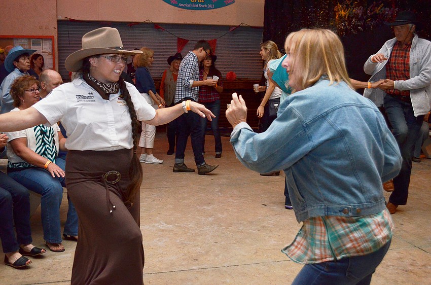 Debby Schaffer and Debby Szczesny take a turn on the dance floor.