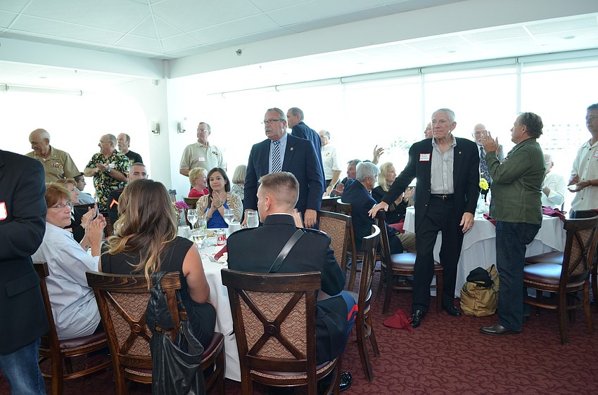 Veterans were recognized individually for the war(s) they served in.