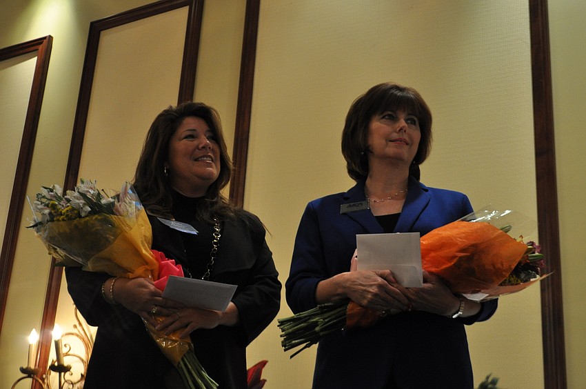 Alliance President Annette Gueli and Joanna Vealey receive recognition for their hard work.