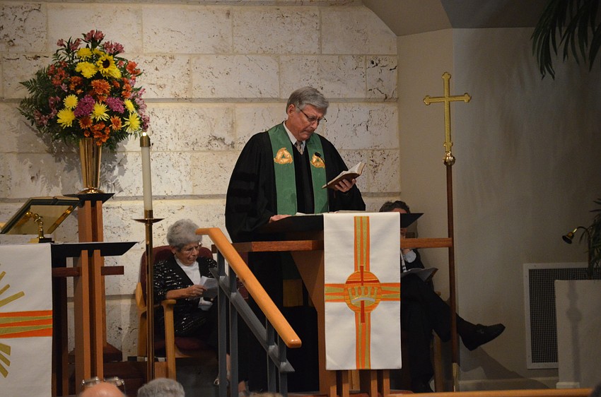Interim Minister Paul Eckel, of Christ Church, reads Luke 12:13-21.
