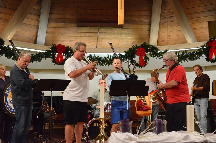 Gary Reinstrom and Larry Jacobs swap their pipes out for a trumpet and saxophone on the classic Sam & Dave soul song â€œHold On, Iâ€™m Comin.â€™â€