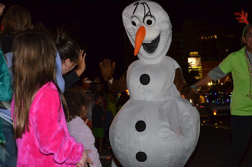 Olaf the snowman from Disneyâ€™s Frozen participated in the parade.