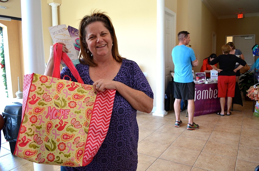 Laurie English shows off her loot.