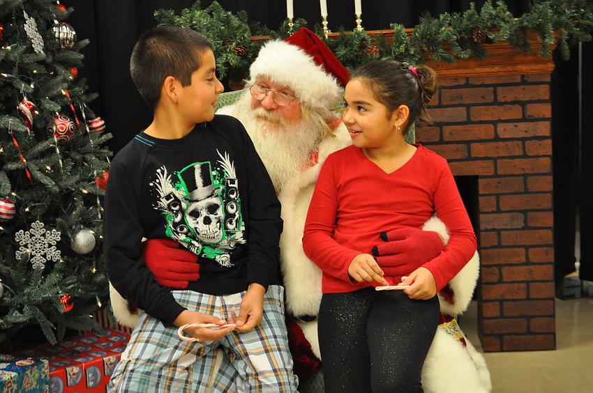 Devan and Miranda Rojas share their wish lists with Santa.