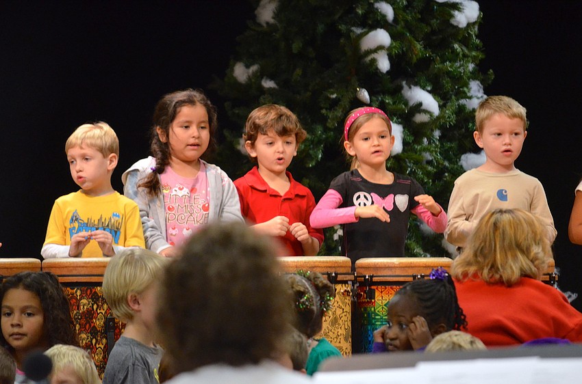 Kindergarten students played songs about holidays celebrated in different countries.