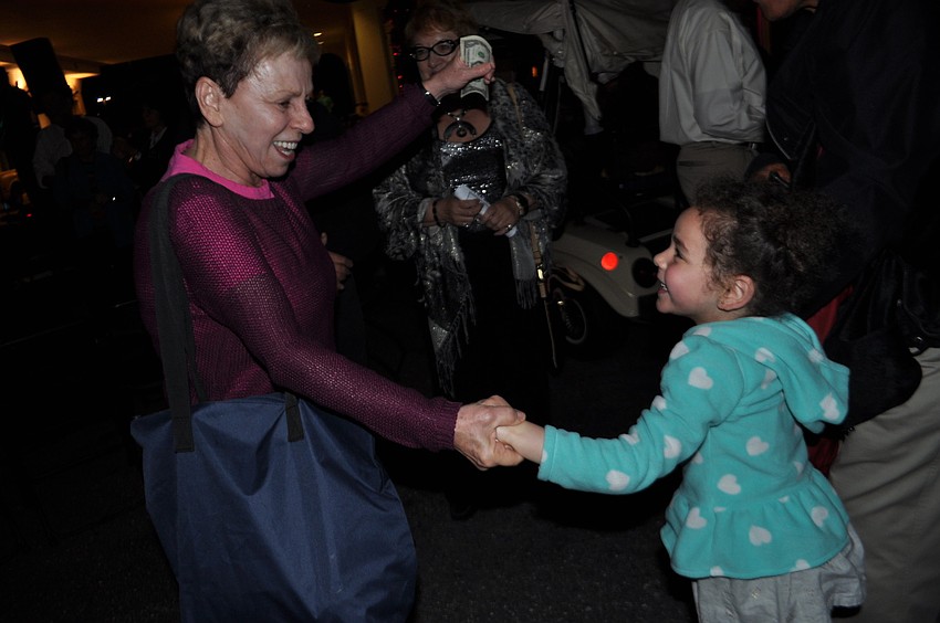 Hana Robbins dances with her granddaughter, Sarah Jane Robbins, 4.